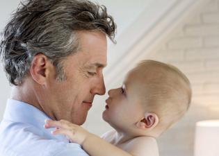 older dad with baby