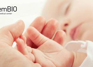 Baby and mother hand