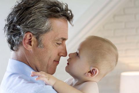 older dad with baby