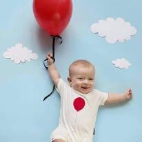Baby with baloon