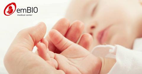 Baby and mother hand